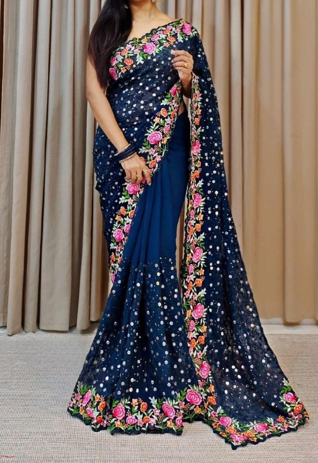 Navy Blue Georgette Saree with Floral Scalloped Border and Mirror-Work Sequins.